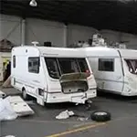 single axle caravan being repaired
